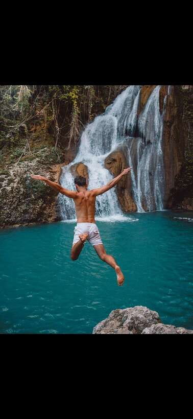 Bohol: Waterfall Hopping & Secret Jungle Trails Guided Tour - Walking through rice fields and jungle trails