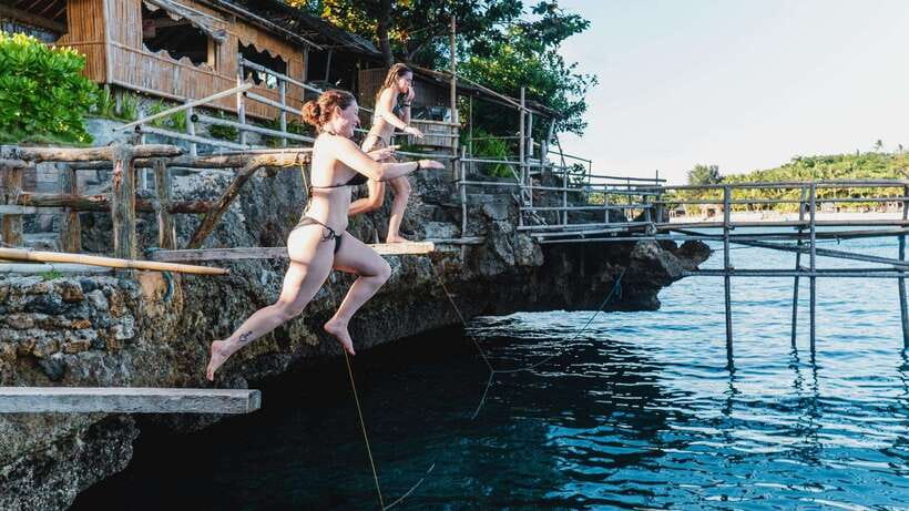 Boracay: Island Hopping & Cliff Jumping by Haqqy Life - The secret cliff-jumping stop and Magic Island fee