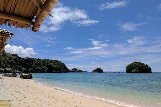 Boracay Island Hopping + Hot Kawa + Parasailing + Helmet Diving - Twenty minutes beneath the water in a helmet