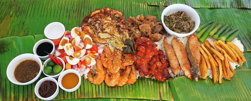 Boracay: Island Hopping Tour with Boodle Fight Lunch - Your first island stop: swimming and coral views