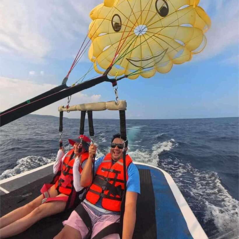 Boracay: Parasailing, Island Hopping, ATV Ride and Kawa Bath - Parasailing above Boracay’s white beach