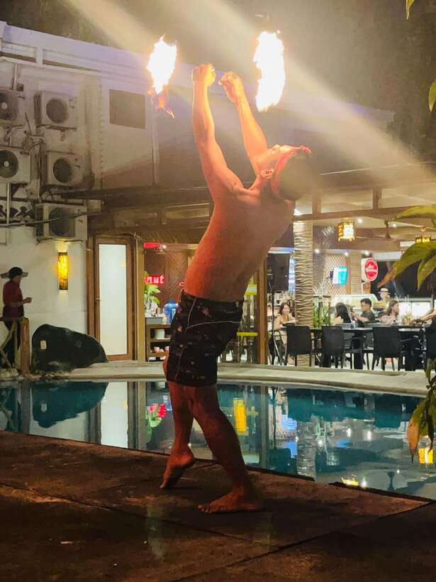 Borocay: Fire Dancing Show at Red Coconut Beach Hotel - Flames on the beach in a 15-minute burst
