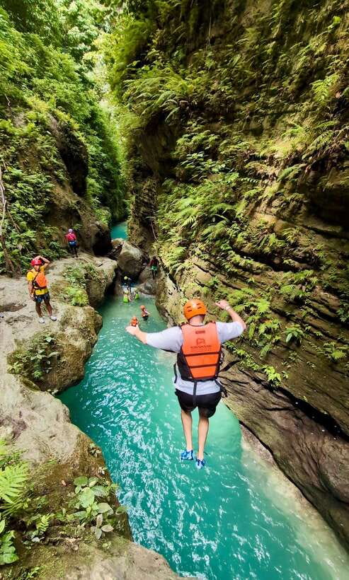 Cebu: Kawasan Canyoneering with Ziplining Adventure - Three hours of gorge walking, swimming, and cliff jumps