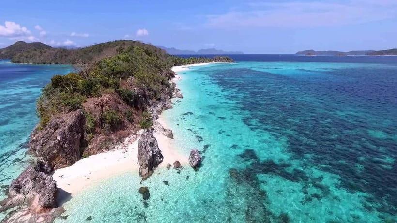 Coron: Coastal Cliffs, Beach & Malcapuya Island Hopping Tour - Three islands, one long day from Coron