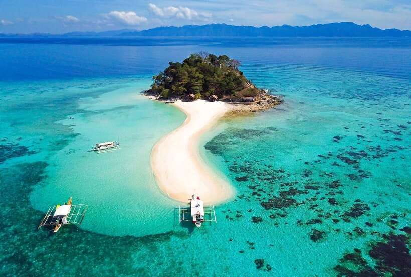 Coron Island Escapade: A Tropical Feast & Adventure - Malcapuya Island gives you the main beach day