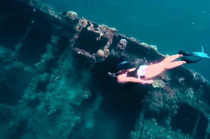 Coron Island Hopping Tour B with Skeleton Wreck & Barracuda Lake - Smith Beach gives the day a softer pause