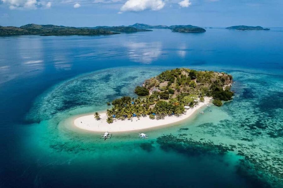 Coron: Reefs and Wrecks Tour with Snorkeling Equipment - Pass Island is the reward after the wrecks