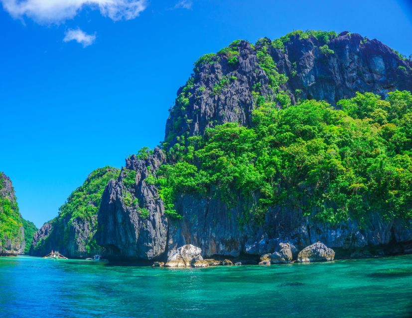 El Nido: Full-Day Premium Island Hopping Catamaran Cruise - Hidden Beach, Helicopter Island, and Seven Commandos