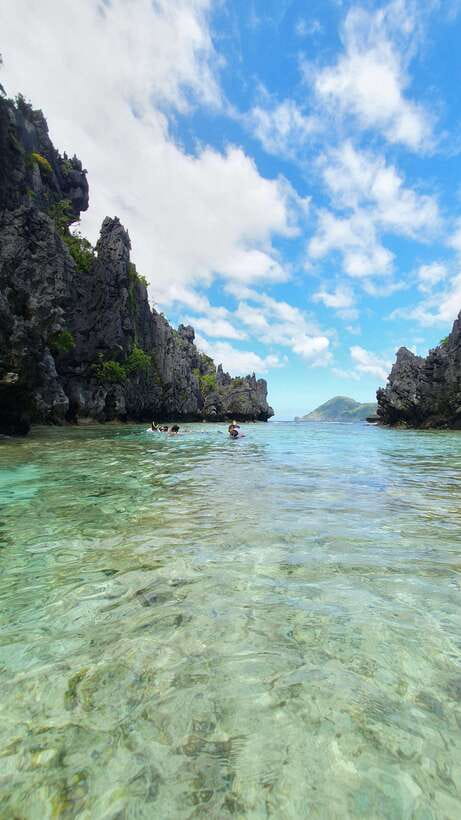 El Nido: Island Hopping and Snorkeling Private Boat Tour C - Hidden Beach and lunch by the water
