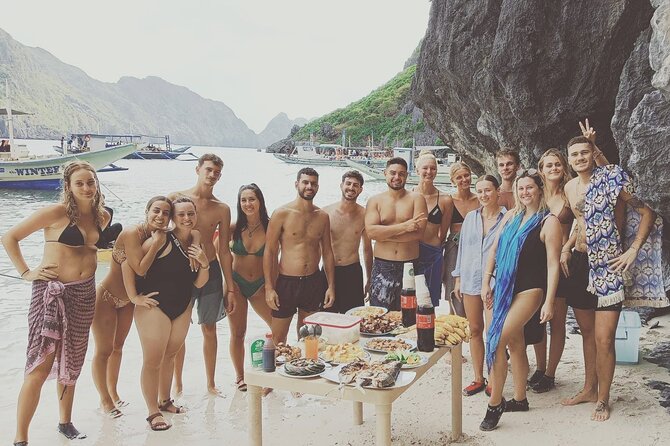 El Nido Tour D Full Day w/ Beach Lunch - Small Lagoon, blue water in a narrow stone corridor