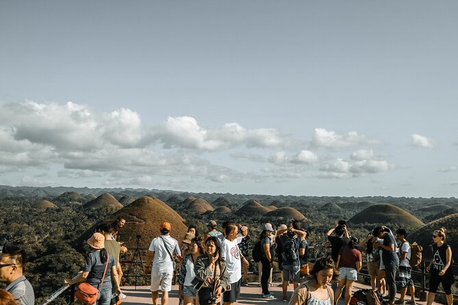 Famous Bohol Chocolate Hills Loboc River Cruise Tarsier Tour - Cross the Sipatan Twin Hanging Bridge