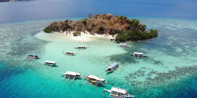 From Coron: Island Hopping Boat Day Trip with Buffet Lunch - What the $125 price really covers