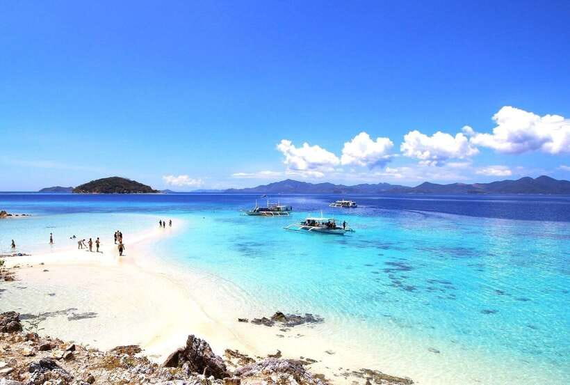 From Coron: Private Island-Hopping Cruise with Lunch - A picnic lunch with fruit and water