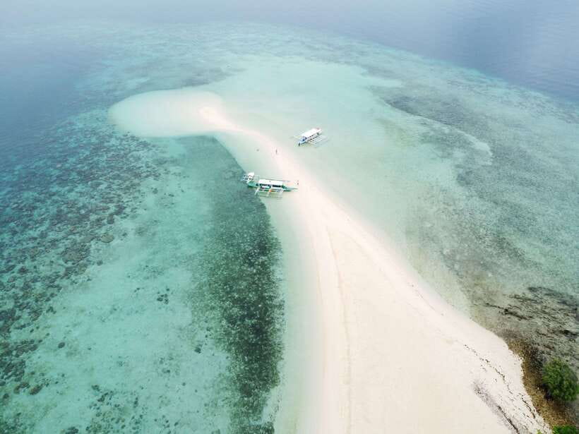 From Coron Town: Beaches and Islands Boat Tour with Lunch - Malcapuya Island, the beach centerpiece