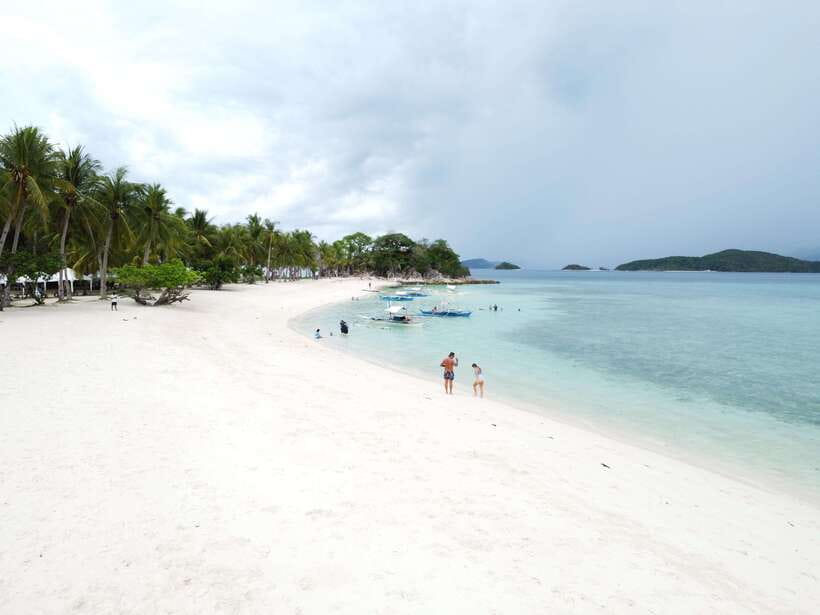 From Coron Town: Beaches and Islands Boat Tour with Lunch - Boat size, group comfort, and the eight-hour schedule