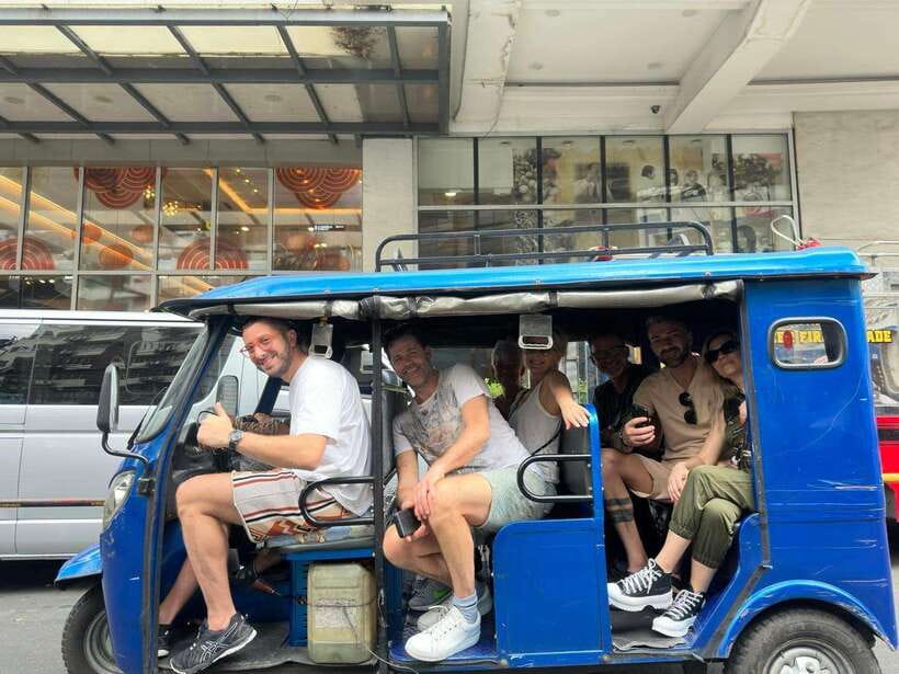 Manila: Guided Tuk Tuk Ride - Walking through local neighborhoods