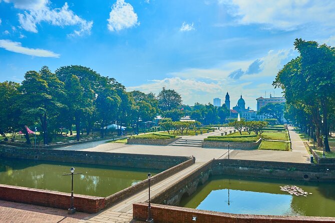 Manila Historical Highlights Private Half Day Tour - The cathedral and Plaza Roma explain civic Manila