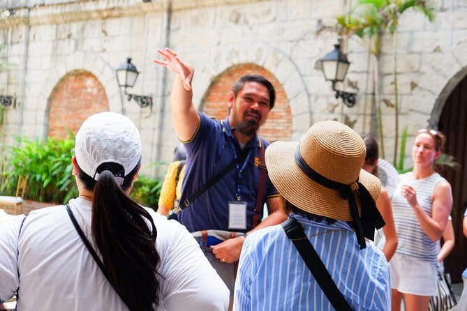 Manila Old & New City Walking Tour With A Guide - Entering Intramuros through the old city