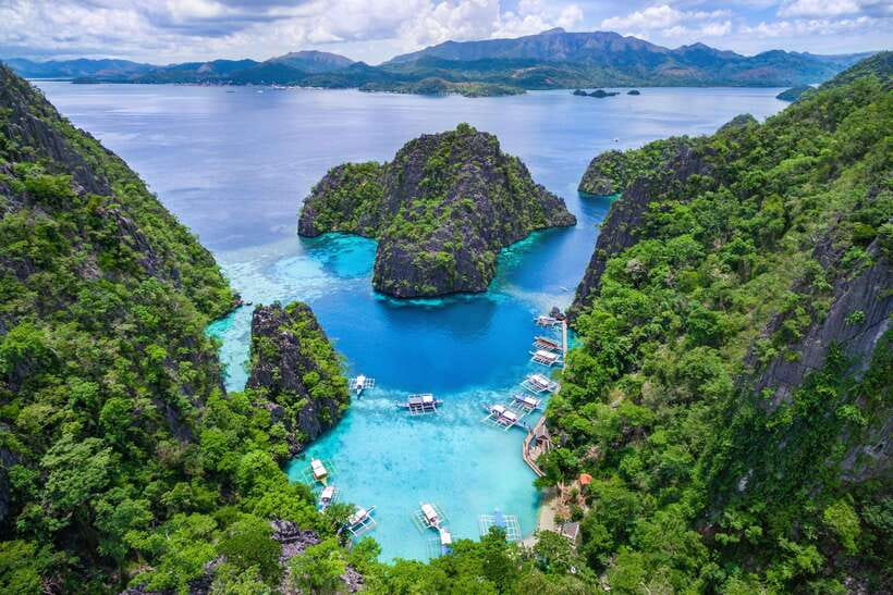 Palawan: Coron Island Super Ultimate Private Tour - Twin Lagoon is the day’s most striking swim