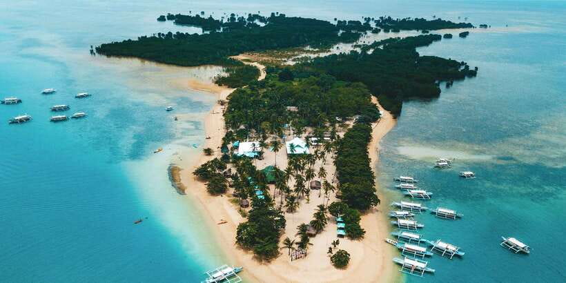 Puerto Princesa: Honda Bay Island Hopping & Optional Massage - Cowrie Island: Lunch, Swimming, and a Long Pause