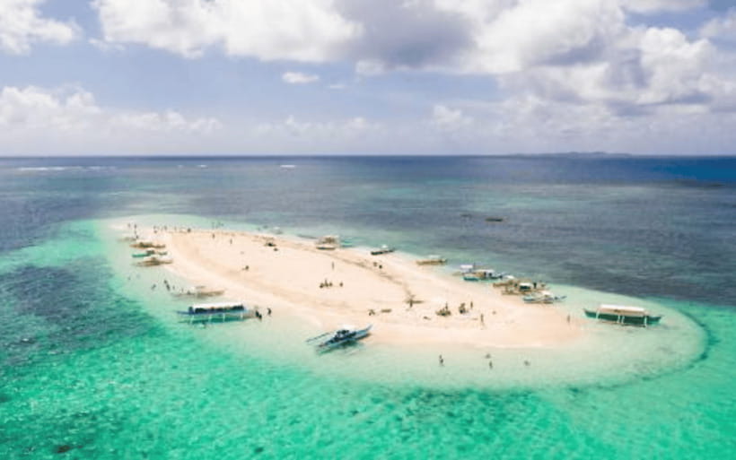 Siargao Tour I (Private Tour) - Daku Island brings the classic beach scene